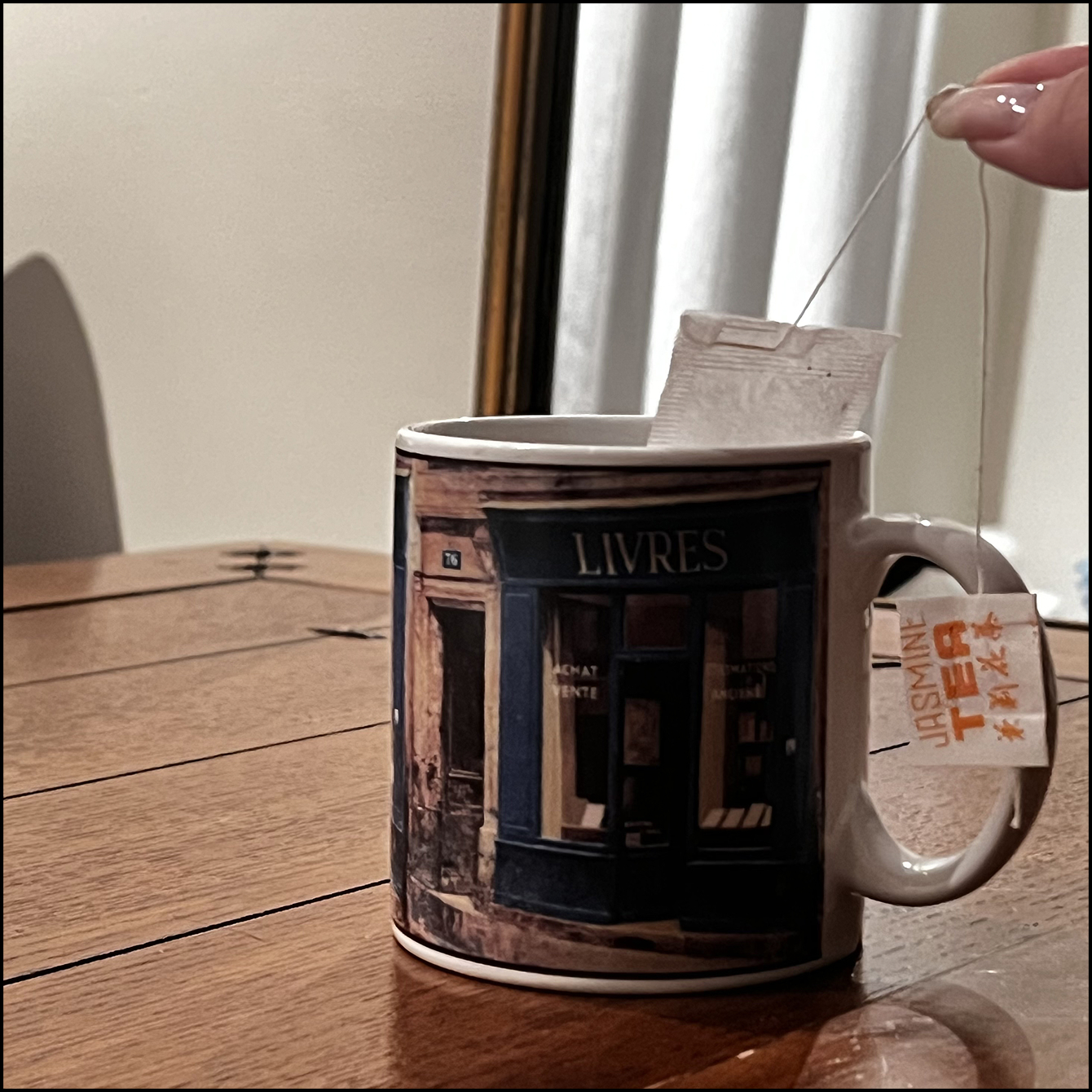 A mug with a tea bag interaction